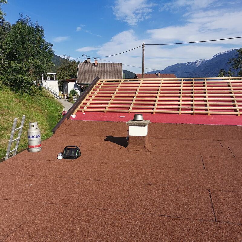 Isolation de toiture par l'extérieur avec liteaux neufs